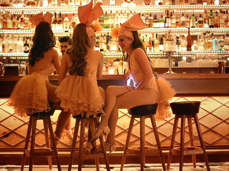 Marion Miami 3 women sitting at bar